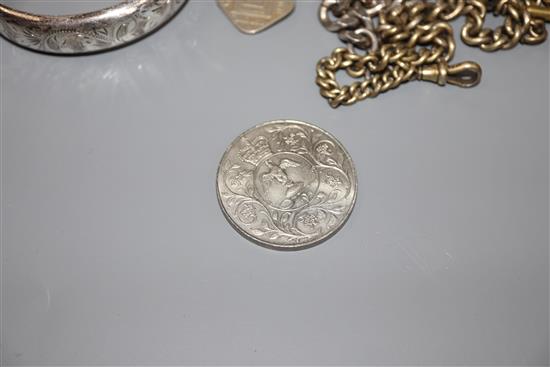 A modern silver identity bracelet, a modern silver bangle, three gilt alberts and a commemorative coin.